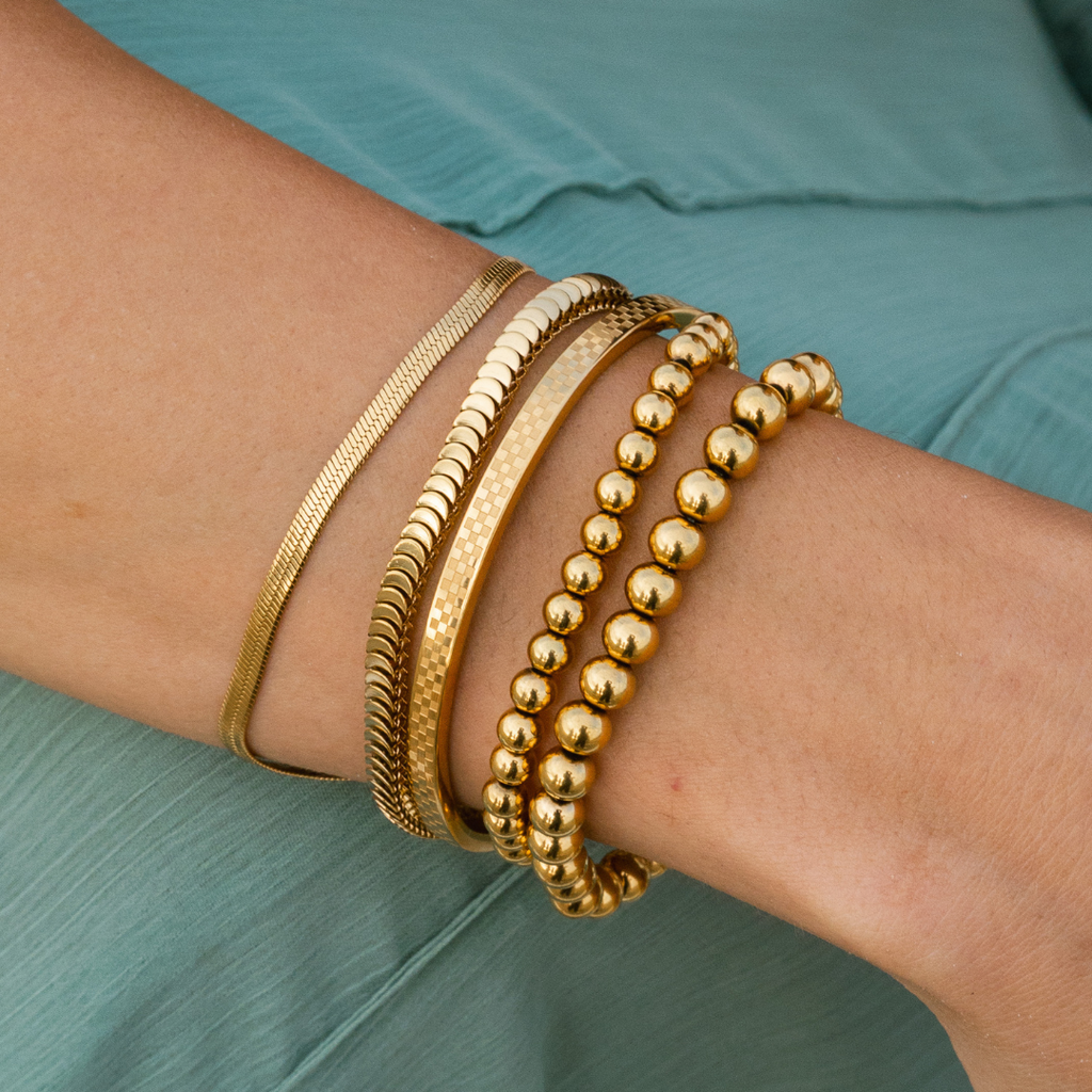 B. Grands Chess Waterproof Gold Bangle Bracelet