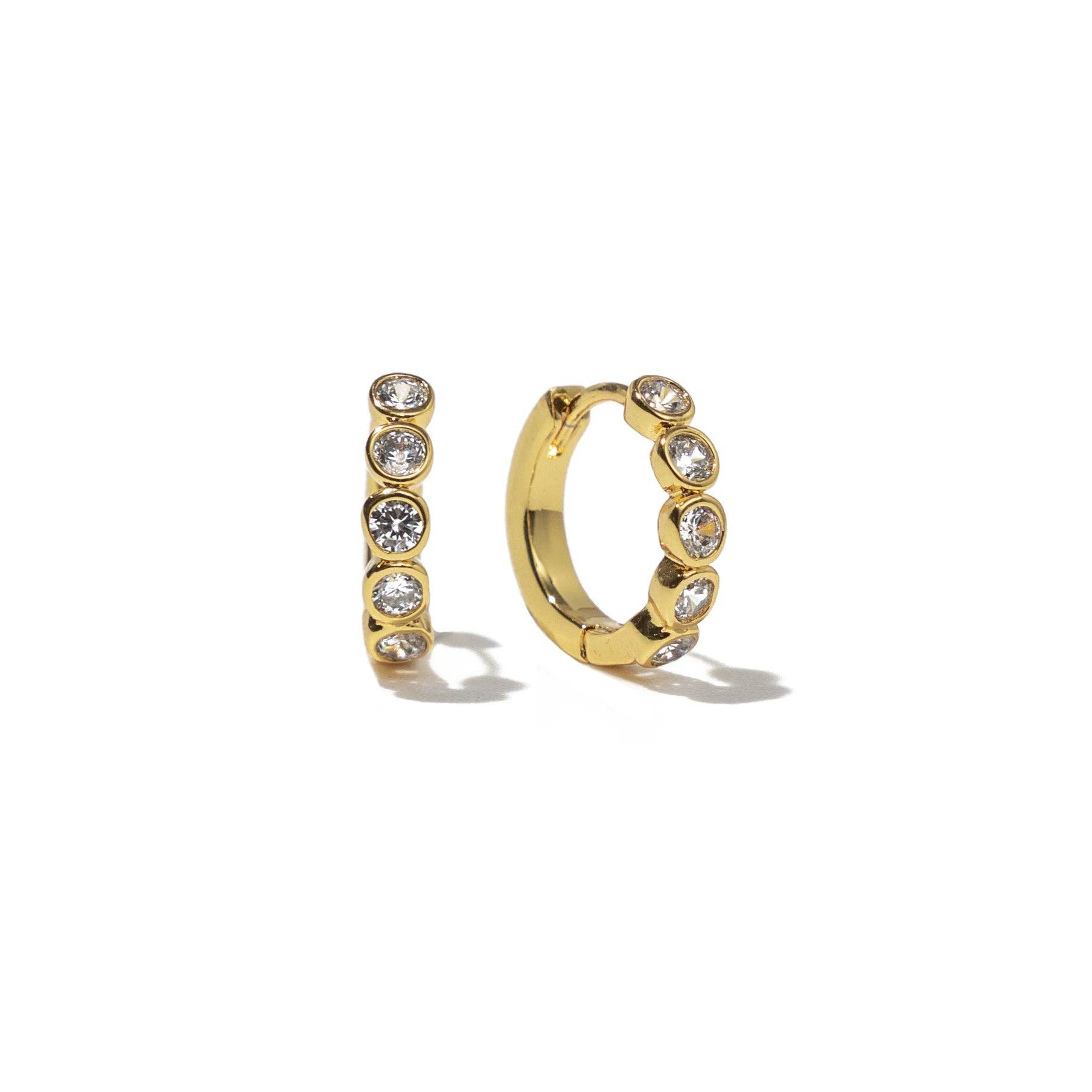B. Grands 18K Gold Round Brilliant Huggies